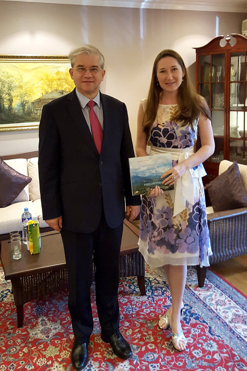 Natalya Bronzova donating her book about the Philippines to Ambassador of Russia in the Philippines I.A.Khovaev