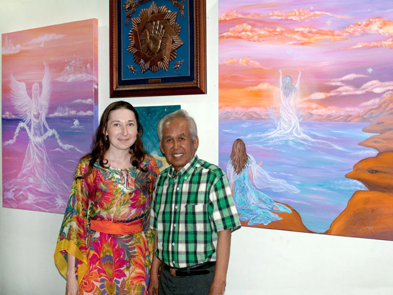 Natalya Bronzova exposing a selection of her cosmic paintings at the Pyramid of Asia