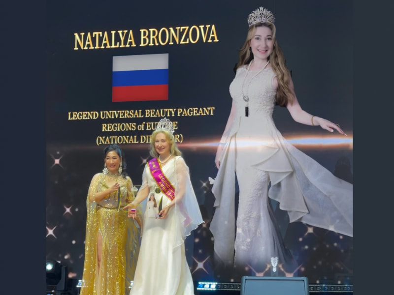 Natalya receiving title Legend Universal Ambassador during Final Gala from Maggie Leong