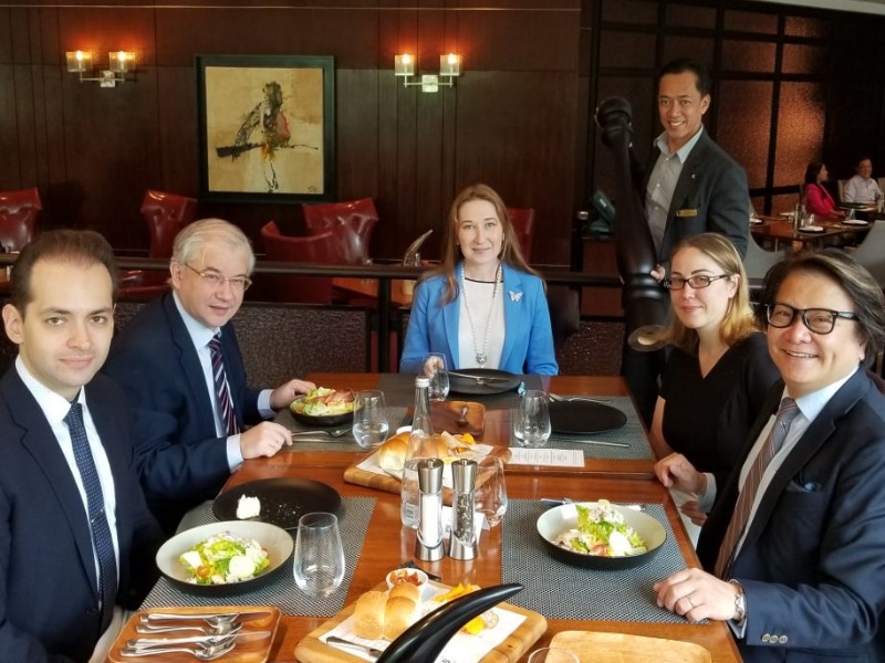 Natalya holding dinner for Ambassador Igor Khovaev, Billy Chan, Luda and Denis