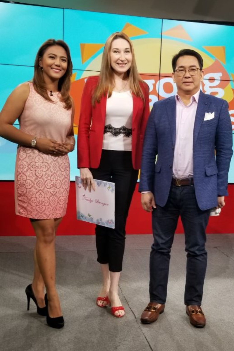Natalya and Cong. John Bertiz (OFW) at TV show, talking on her Solo exhibition at the Congress